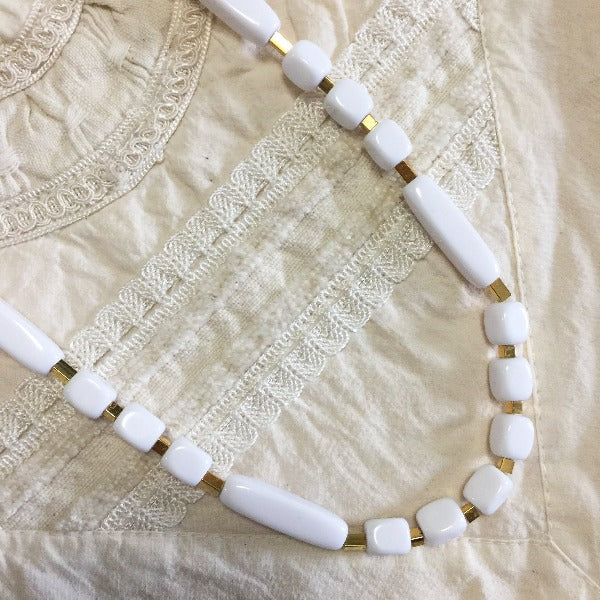 Vintage hotsell White & Gold Beaded Trifari Necklace