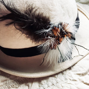 Cream felt feathered hat