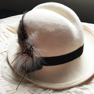 Cream felt feathered hat
